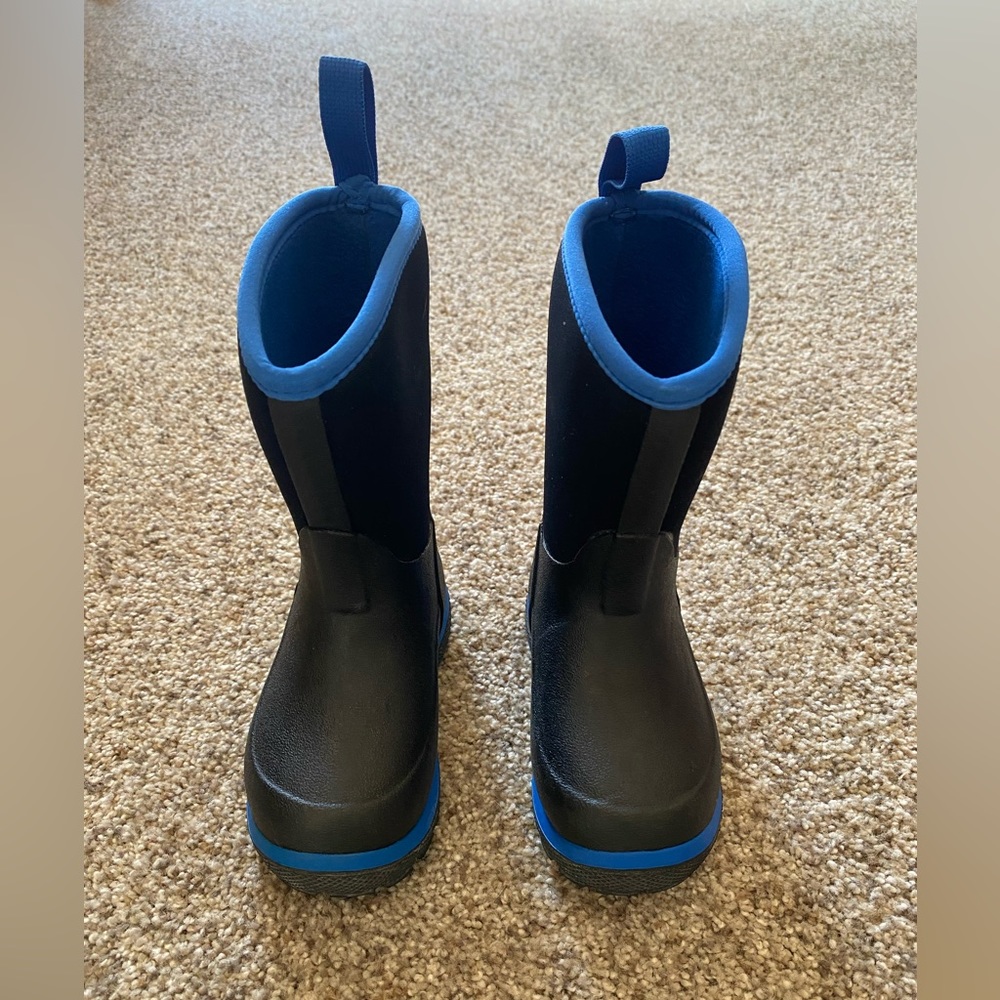 Muck boots , bought for my son he out grew before he could wear .